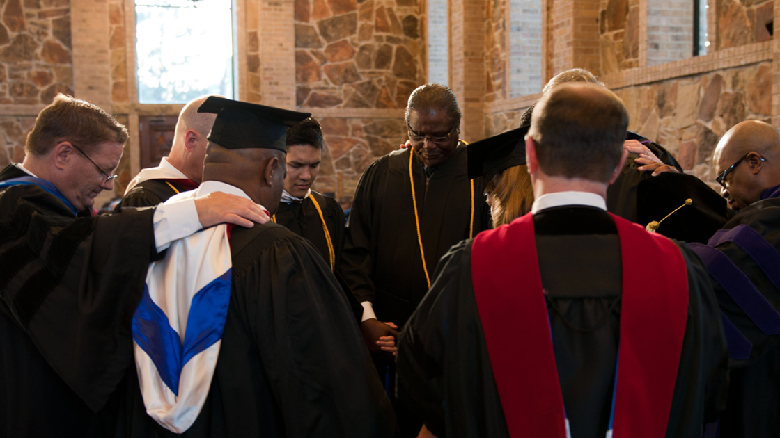 Students Praying - Grace School of Theology in The Woodlands, TX