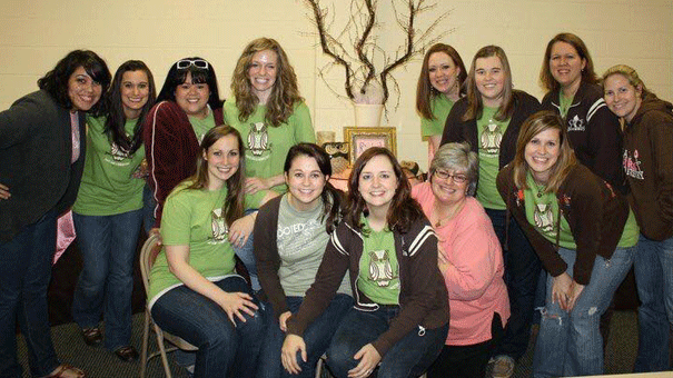 Merritt (center) with the women of SAGE Girls Ministry